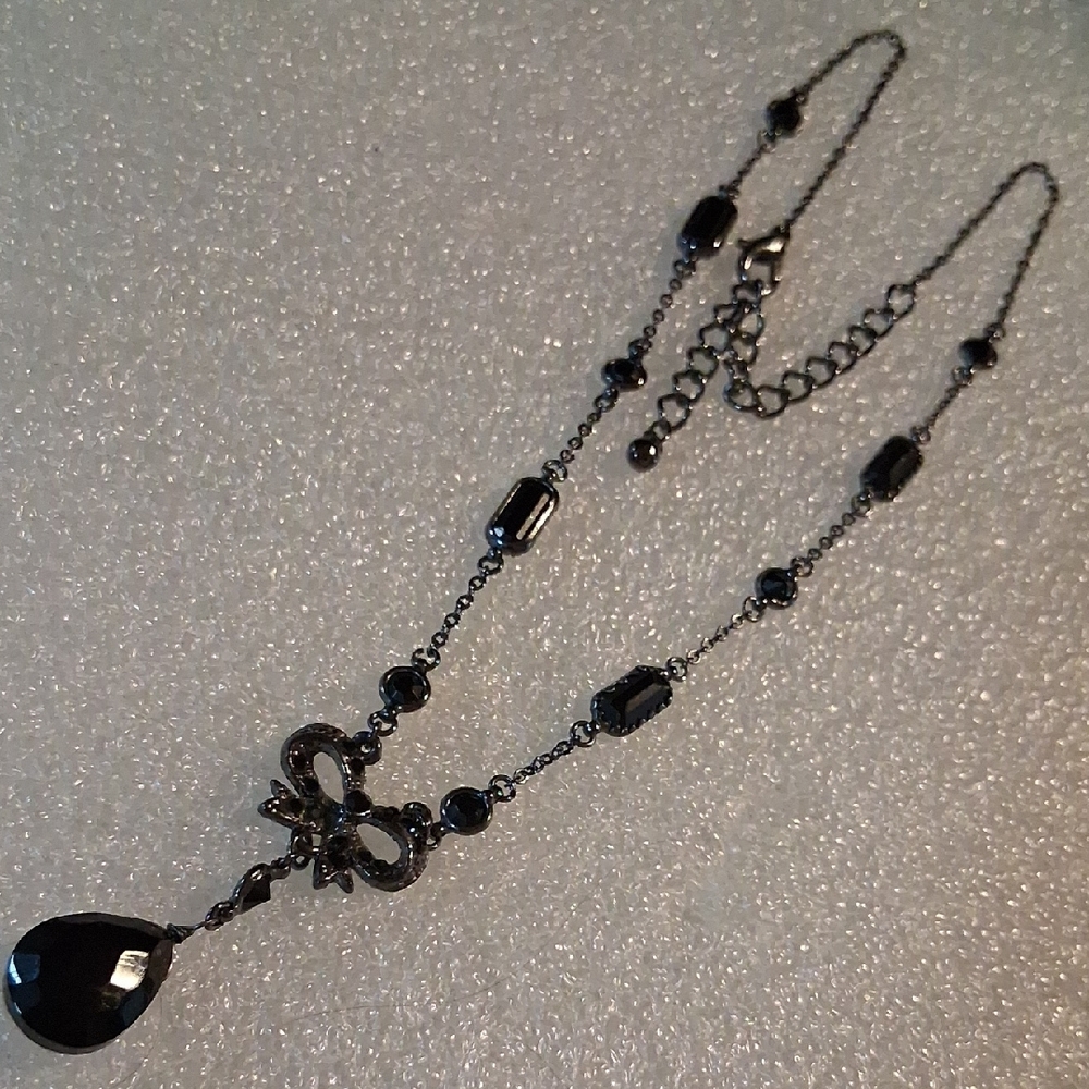 Elegant Black Necklace with Bow Pendant